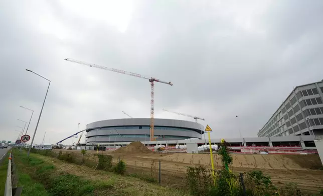 An outside view of the Santa Giulia Ice Hockey Arena, in Milan, where Ice Hockey discipline of the Milan Cortina 2026 Winter Olympics will take place, in Italy, Wednesday, Oct. 22, 2025. (AP Photo/Luca Bruno)