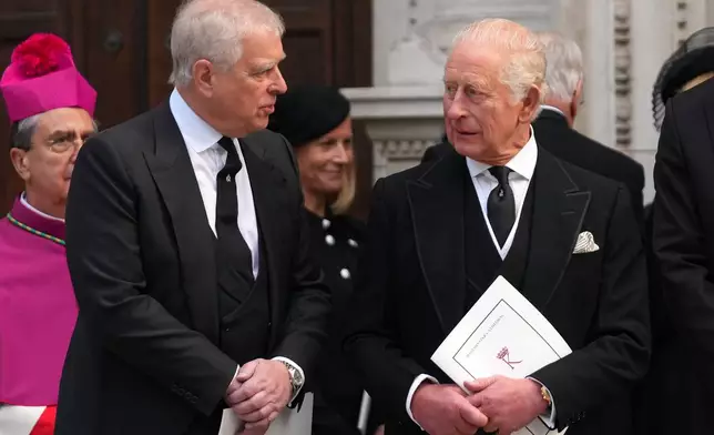 FILE - Britain's Prince Andrew, left, and Britain's King Charles III leave after the Requiem Mass service for the Duchess of Kent at Westminster Cathedral in London, Tuesday, Sept. 16, 2025. (AP Photo/Joanna Chan, File)