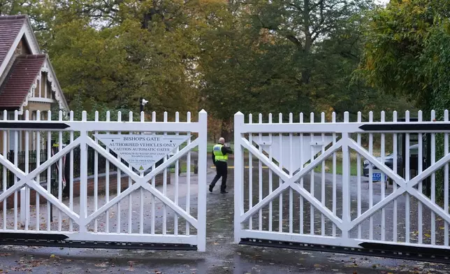Gates are closing near to the Royal Lodge, following the announcement that Prince Andrew will be stripped of his titles and leave the 30-room mansion he has occupied for more than 20 years in Windsor, England, Friday, Oct. 31, 2025.(AP Photo/Alastair Grant)