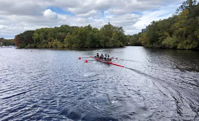 South African rowers, from left, Sheldon Krishnasamy, Lwazi-Tsebo Zwane, Lebone Mokheseng, and Sepitle Leshilo practice on the Charles River in preparation for the Head of the Charles Regatta, Wednesday, Oct. 15, 2025, in Boston. (AP Photo/Rodrique Ngowi)