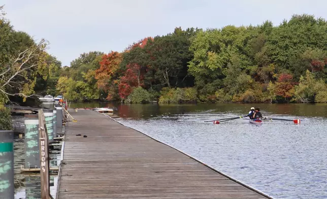 South African rowers practice on the Charles River in preparation for the Head of the Charles Regatta, Wednesday, Oct. 15, 2025, in Boston. (AP Photo/Leah Willingham)