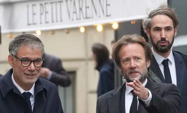 French socialist party secretary general Olivier Faure, left, and Boris Vallaud, president of the socialist parliament members at the National Assembly, arrive for a meeting with outgoing Prime Minister Sebastien Lecornu, Wednesday, Oct. 8, 2025 in Paris. (AP Photo/Christophe Ena)