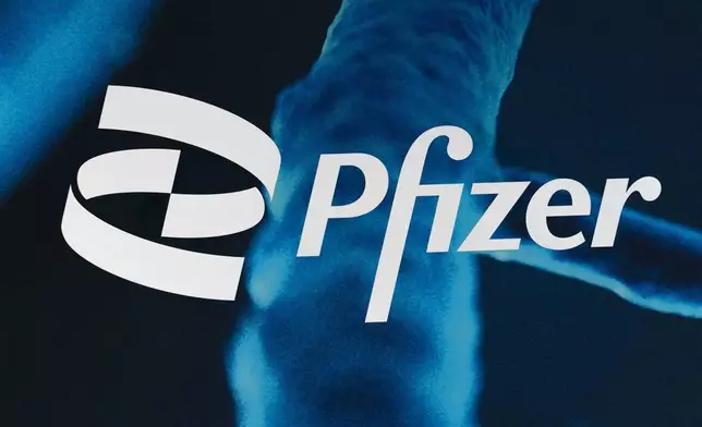 FILE - The Pfizer logo is displayed at the company's headquarters, Friday, Feb. 5, 2021, in New York. (AP Photo/Mark Lennihan, File)