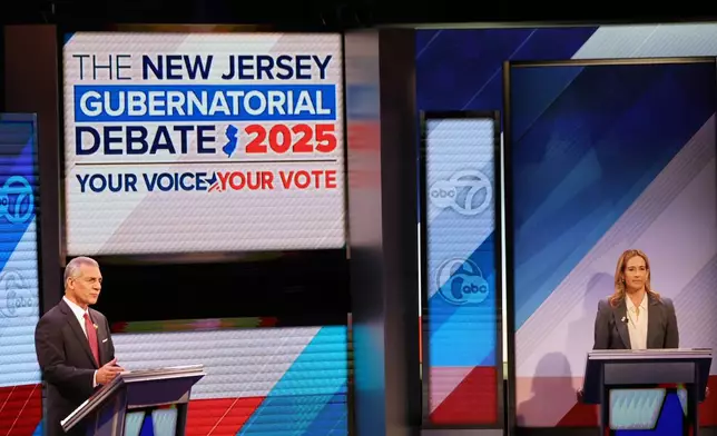 Republican Jack Ciattarelli, left, and Democrat Mikie Sherrill participate in the final debate in the New Jersey governor's race, Wednesday, Oct. 8, 2025, in New Brunswick, N.J. (AP Photo/Heather Khalifa)