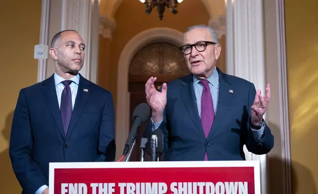 House Minority Leader Hakeem Jeffries, D-N.Y., left, and Senate Minority Leader Chuck Schumer, D-N.Y., speak to reporters outside the Senate chamber as they charge President Donald Trump and the Republicans with the government shutdown, at the Capitol in Washington, Thursday, Oct. 16, 2025. (AP Photo/J. Scott Applewhite)