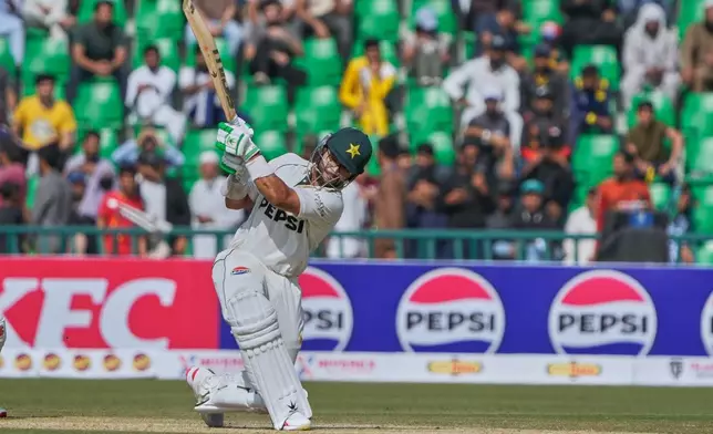 Pakistan's Imam-ul-Haq bats during the first day of of first test cricket match between Pakistan and South Africa, in Lahore, Pakistan, Sunday, Oct. 12, 2025. (AP Photo/K.M. Chaudary)