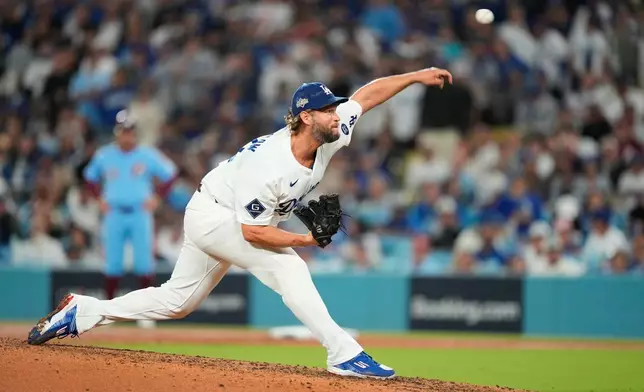 Los Angeles Dodgers relief pitcher Clayton Kershaw throws to a Philadelphia Phillies batter during the seventh inning in Game 3 of baseball's National League Division Series, Wednesday, Oct. 8, 2025, in Los Angeles. (AP Photo/Mark J. Terrill)