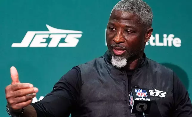 New York Jets head coach Aaron Glenn talks after an NFL football game against the Dallas Cowboys Sunday, Oct. 5, 2025, in East Rutherford, N.J. (AP Photo/Yuki Iwamura)