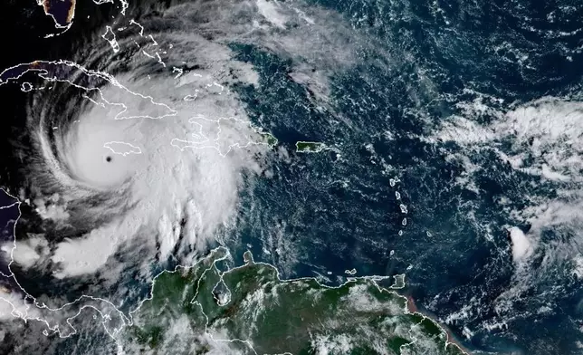 This satellite image provided by the National Oceanographic and Atmospheric Administration shows Hurricane Melissa, Tuesday, Oct. 28, 2025. (NOAA via AP)