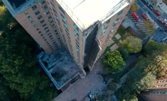 This image provided by the Fire Department of New York, FDNY shows part of a high-rise apartment building that collapsed, leaving a corner of the building in a pile of rubble, in New York, Wednesday, Oct. 1, 2025. (FDNY via AP)