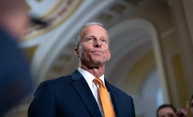 Senate Majority Leader John Thune, R-S.D., speaks with reporters following a closed-door meeting of Senate Republicans on day 28 of the government shutdown, at the Capitol in Washington, Tuesday, Oct. 28, 2025. (AP Photo/J. Scott Applewhite)