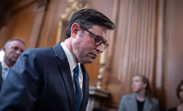 Speaker of the House Mike Johnson, R-La., departs a news conference on the 30th day of the government shutdown, at the Capitol in Washington, Thursday, Oct. 30, 2025. (AP Photo/J. Scott Applewhite)