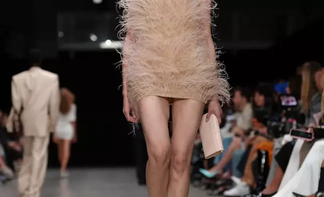 A model wears a creation as part of the Stella McCartney Spring/Summer 2026 collection presented in Paris, Tuesday, Sept. 30, 2025. (AP Photo/Aurelien Morissard)