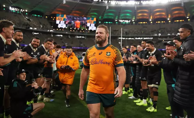 Australia's James Slipper is cheered from the field following the Bledisloe Cup rugby test between the All Blacks and the Wallabies in Perth, Australia, Saturday, Oct 4, 2025. (AP Photo/Gary Day)