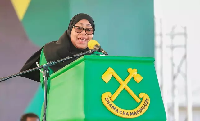 FILE - Tanzania's President Samia Suluhu Hassan delivers her remarks during the launch of the party's campaign for the upcoming general elections, at Tanganyika Packers grounds in Dar es Salaam, Tanzania, Thursday, Aug. 28, 2025. (AP Photo/Steven Genya, File)