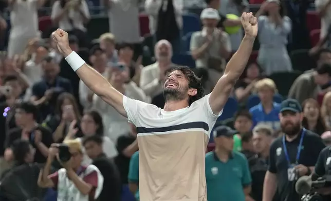 Valentin Vacherot of Monaco celebrates after winning the final of the Shanghai Masters tennis tournament, defeating Arthur Rinderknech of France at Qizhong Forest Sports City Tennis Center, in Shanghai, China, Sunday, Oct. 12, 2025. (AP Photo/Andy Wong)