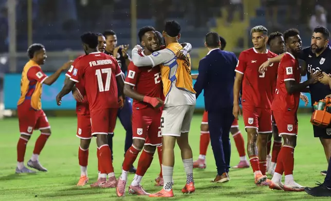 Panama's players celebrate after beating El Salvador during a World Cup 2026 qualifying soccer match at Cuscatlan stadium in San Salvador, El Salvador, Friday, Oct. 10, 2025. (AP Photo/Salvador Melendez)