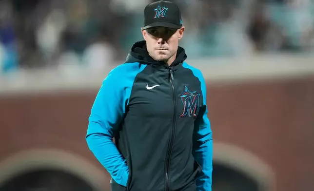FILE - Miami Marlins manager Skip Schumaker walks off the field during the third inning of a baseball game against the San Francisco Giants= in San Francisco, Friday, Aug. 30, 2024. (AP Photo/Jeff Chiu, File)