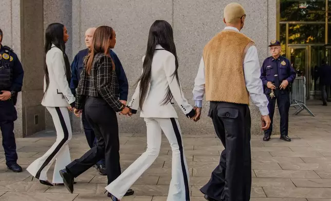 Quincy Brown, Chance Combs, D'lila Combs and Jessie, the children of Sean "Diddy" Combs, arrives to the Manhattan federal court for the sentencing of Sean "Diddy" Combs in New York, Friday, Oct. 3, 2025. (AP Photo/Eduardo Munoz Alvarez)