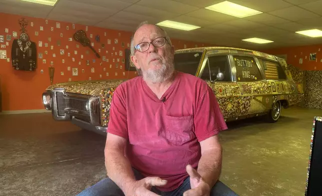 J.D. Stevens talks about his father Dalton Stevens' button museum and all of its folk art in Bishopville, S.C., on Tuesday, Sept. 9, 2025. (AP Photo/Jeffrey Collins)