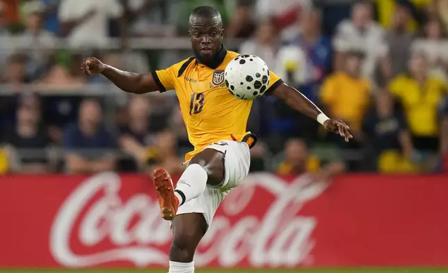 Ecuador forward Enner Valencia (13) handles a pass during the first half of an international friendly soccer match against the United States in Austin, Texas, Friday, Oct. 10, 2025. (AP Photo/Eric Gay)