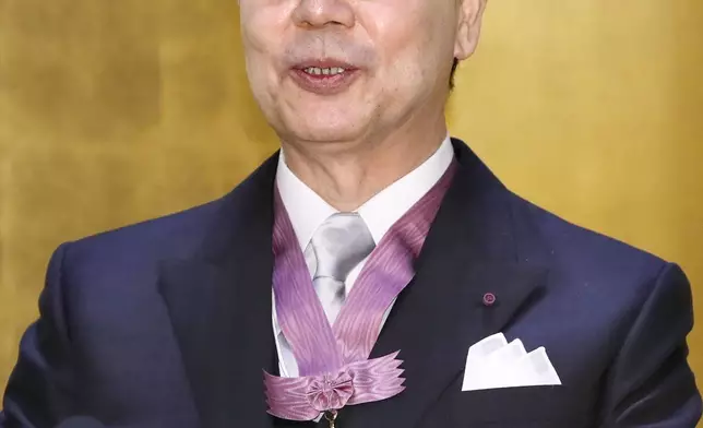 Shimon Sakaguchi speaks during a news conference after receiving an award of culture from Japan's Imperial Household Agency in Tokyo, Nov. 3, 2019. (Kyodo News via AP)