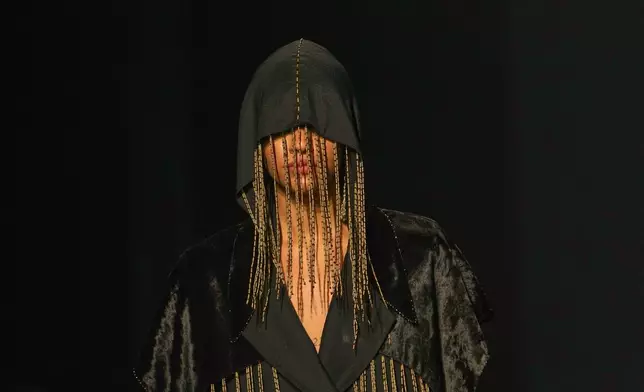 A model wears a creation by AseemKapoor during Lakmé Fashion Week in partnership with Fashion Design Council of India (FDCI) in New Delhi, India, Thursday, Oct. 9, 2025. (AP Photo/Manish Swarup)