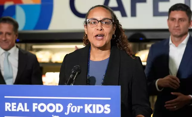 Human Services Agency Secretary Kim Johnson speaks at a news conference at Belvedere Middle School, Wednesday, Oct. 8, 2025, in Los Angeles. (AP Photo/Damian Dovarganes)