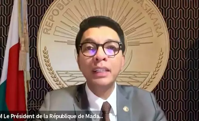 This grab taken from video released on Monday, Oct. 13, 2025, shows Madagascar President Andry Rajoelina giving a speech from an unknown location after an apparent coup attempt forced him into hiding. (Presidency Of The Republic Of Madagascar via AP)