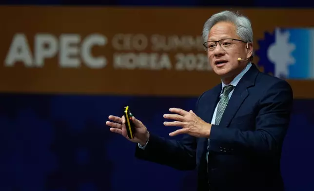 NVIDIA CEO Jensen Huang makes a keynote speech during the special session at the Asia-Pacific Economic Cooperation (APEC) CEO summit in Gyeongju, South Korea, Friday, Oct. 31, 2025. (AP Photo/Ng Han Guan)