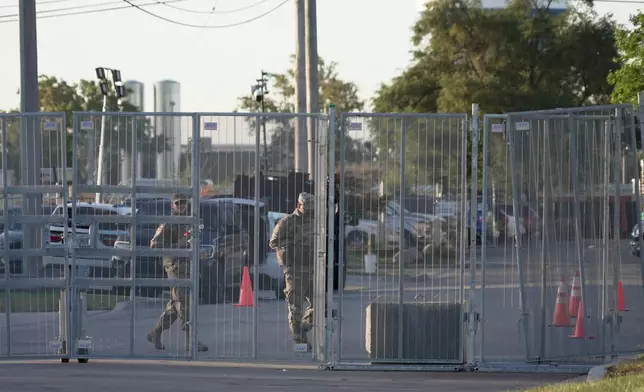 Personnel walk inside an immigration processing facility in Broadview, Ill., on Thursday, Oct. 9, 2025. (AP Photo/Laura Bargfeld)
