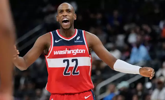 Washington Wizards forward Khris Middleton reacts during the first half of a preseason NBA basketball game against the Detroit Pistons Thursday, Oct. 16, 2025, in Detroit. (AP Photo/Ryan Sun)BKN