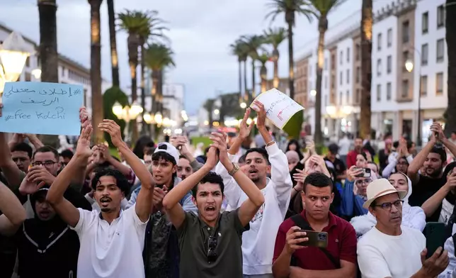 People take part in a youth-led protest against corruption and calling for education and healthcare reforms, in Rabat, Morocco, Thursday, Oct. 9, 2025. (AP Photo/Mosa'ab Elshamy)