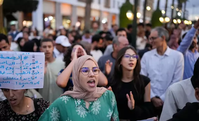 People take part in a youth-led protest against corruption and calling for education and healthcare reforms, in Rabat, Morocco, Thursday, Oct. 9, 2025. (AP Photo/Mosa'ab Elshamy)