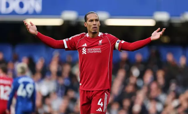 Liverpool's Virgil van Dijk gestures during the English Premier League soccer match between Chelsea and Liverpool at Stamford Bridge in London, Saturday, Oct. 4, 2025. (AP Photo/Ian Walton)