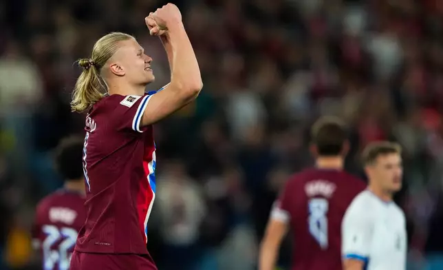 Norway's Erling Haaland celebrates after scoring his the third goal during the World Cup qualifying soccer match between Norway and Israel in Oslo, Saturday, Oct. 11, 2025. (Fredrik Varfjell/NTB Scanpix via AP)