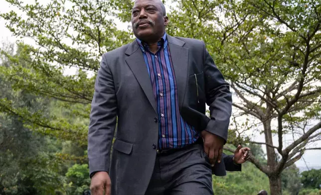 FILE - Former Democratic Republic of the Congo President Joseph Kabila arrives to meet with religious leaders at his Kinyogote residence in M23 controlled Goma, Eastern Congo, May 29, 2025. (AP Photo/Moses Sawasawa, File)