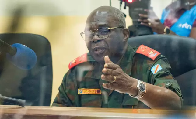Lieutenant General Mutombo Katalayi, president of the court, speaks during the verdict in the trial of former Congolese President Joseph Kabila at the military court in Kinshasa, Democratic Republic of Congo, Tuesday, Sept. 30, 2025 (AP Photo/Samy Ntumba Shambuyi)