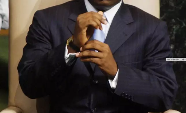 FILE - Joseph Kabila, president of the Democratic Republic of the Congo, listens after speaking to the 56th United Nations General Assembly, Nov. 11, 2001 at U.N. headquarters in New York. (AP Photo/Richard Drew, file)