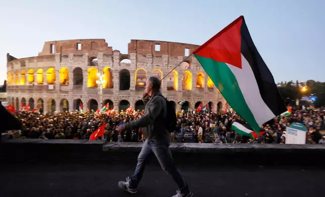 Pro-Palestinian demonstrators attend a rally in Rome, Italy, Oct. 2, 2025, in solidarity with the Global Sumud Flotilla after ships were intercepted by the Israeli navy. (Cecilia Fabiano/LaPresse via AP)