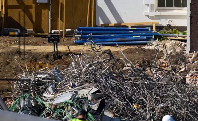 Wires, rebar, and debris are seen as work continues on a largely demolished part of the East Wing of the White House, Thursday, Oct. 23, 2025, in Washington, before construction of a new ballroom. (AP Photo/Jacquelyn Martin)
