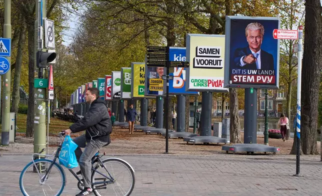 Election billboards of 26 of the 27 political parties participating in the Oct. 29 general elections are lined up in The Hague, Netherlands, Wednesday, Oct. 22, 2025. (AP Photo/Peter Dejong)