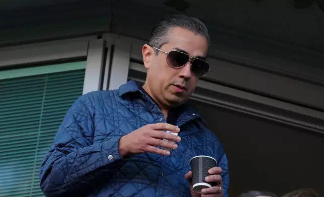 FILE - Chelsea co-owner Behdad Eghbali watches before the start of the English Premier League soccer match between Chelsea and Newcastle at Stamford Bridge in London, Sunday, Oct. 27, 2024. (AP Photo/Dave Shopland, File)