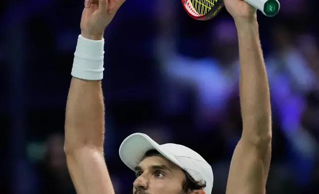 Vacherot of Monaco celebrates winning a point from Cameron Norrie of Great Britain during their third round men's singles match at the Paris Masters tennis tournament at the Paris La Defense Arena, Thursday, Oct. 30, 2025, in Paris. (AP Photo/Michel Euler)