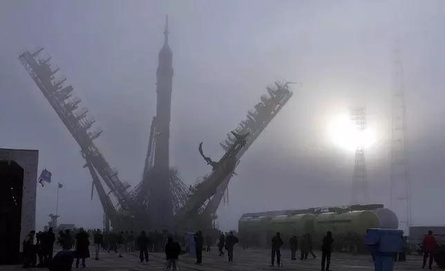 FILE - The Soyuz booster is mounted to the launch pad at the Baikonur cosmodrome, Kazakstan, Sunday, Oct. 29, 2000, ahead of the launch of U.S. astronaut Bill Shepherd, and Russian cosmonauts Sergei Krikalyov and Yuri Gidzenko to be the first residents on the International Space Station. (AP Photo/Mikhail Metzel, File)