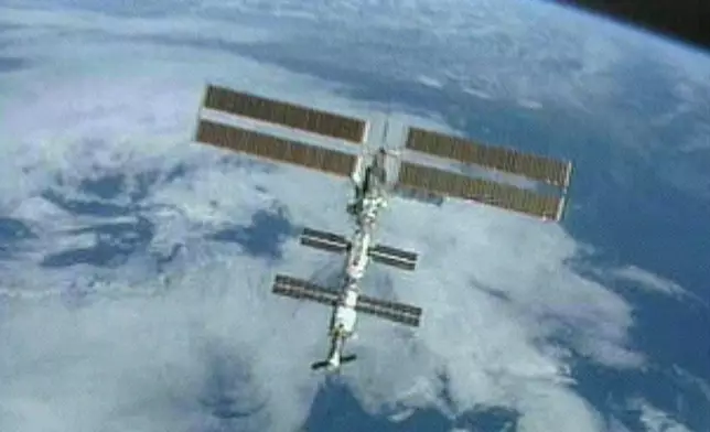 FILE - In this image from video provided by NASA, the International Space Station Alpha is seen against the Northern Atlantic Ocean after the space shuttle Endeavour undocked, Sunday, April 29, 2001. (AP Photo/NASA TV, File)