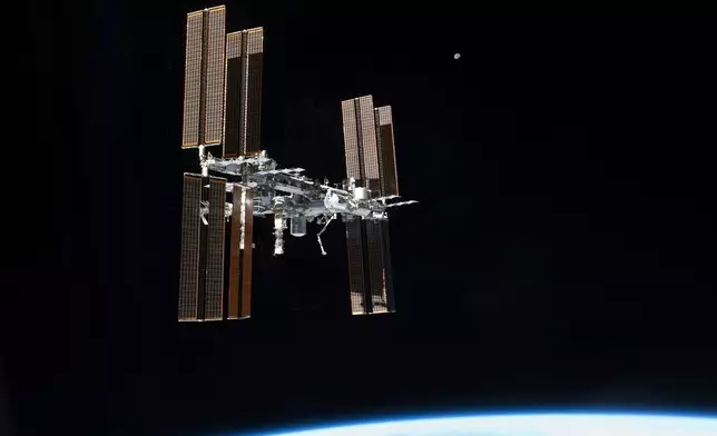 FILE - The International Space Station is seen from the space shuttle Atlantis on July 19, 2011, after it left the orbiting complex. (NASA via AP, File)