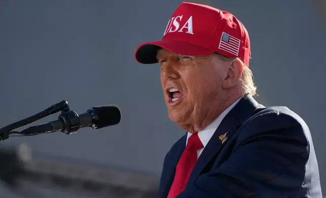 FILE - President Donald Trump speaks during a celebration for the 250th anniversary of the U.S. Navy aboard the USS Harry S. Truman at Naval Station Norfolk, Sunday Oct. 5, 2025 in Norfolk, Va. (AP Photo/Alex Brandon, File)
