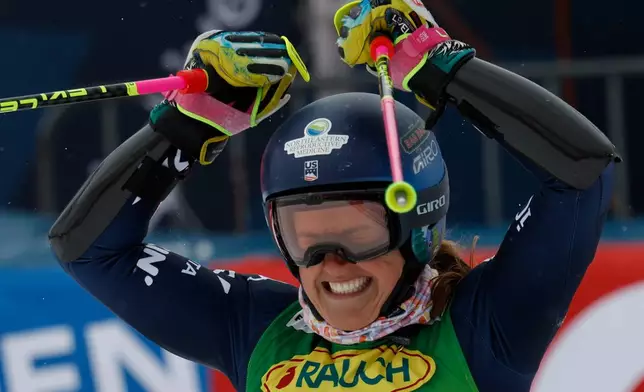United States' Paula Moltzan celebrates at the finish area of an alpine ski, women's World Cup giant slalom, in Soelden, Austria, Saturday, Oct. 25, 2025. (AP Photo/Alessandro Trovati)