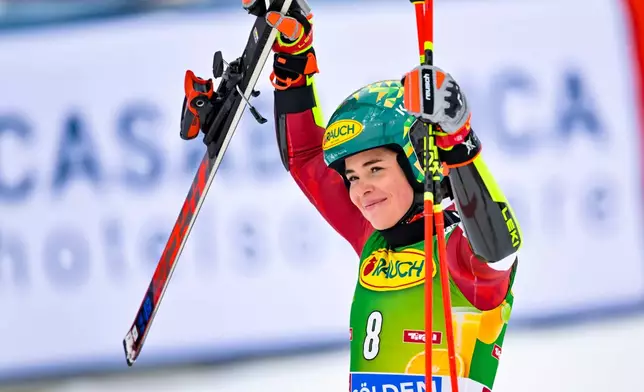 Austria's Julia Scheib celebrates winning an alpine ski, women’s World Cup giant slalom, in Soelden, Austria, Saturday, Oct. 25, 2025. Gian Ehrenzeller/Keystone via AP)